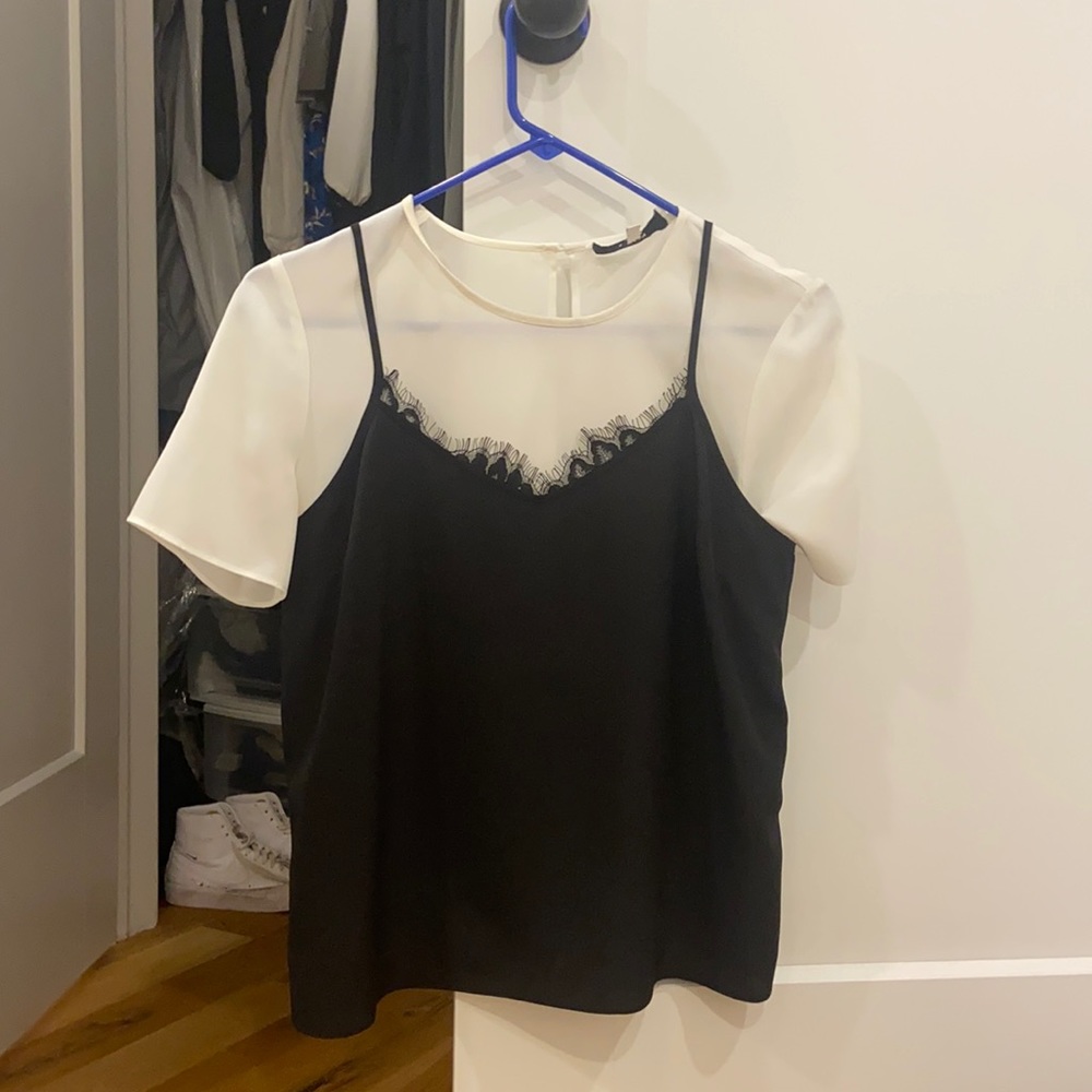 Likely two piece top with lace detailing